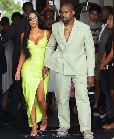 Kim Kardashian and husband Kanye West at a friend's wedding in Miami, August, 2018