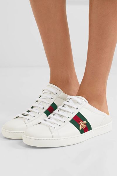 <a href="https://www.net-a-porter.com/au/en/product/895042/gucci/ace-embroidered-collapsible-heel-leather-sneakers" target="_blank">Gucci Ace Embroidered Collapsible-Heel Leather Sneakers, $635.</a>
