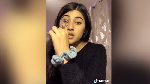 The video starts with a US teen offering eyelash curling advice to her followers. But this is no ordinary beauty tip.