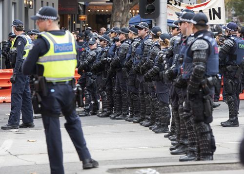 Some officers wore riot gear to the march. (AAP)