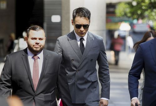 SMH NEWS: Chinese Actor Yunxiang Gao arrives at the Downing Centre Courts, in the Sydney CBD . October 29, 2019. Photo by James Alcock/Nine Media.