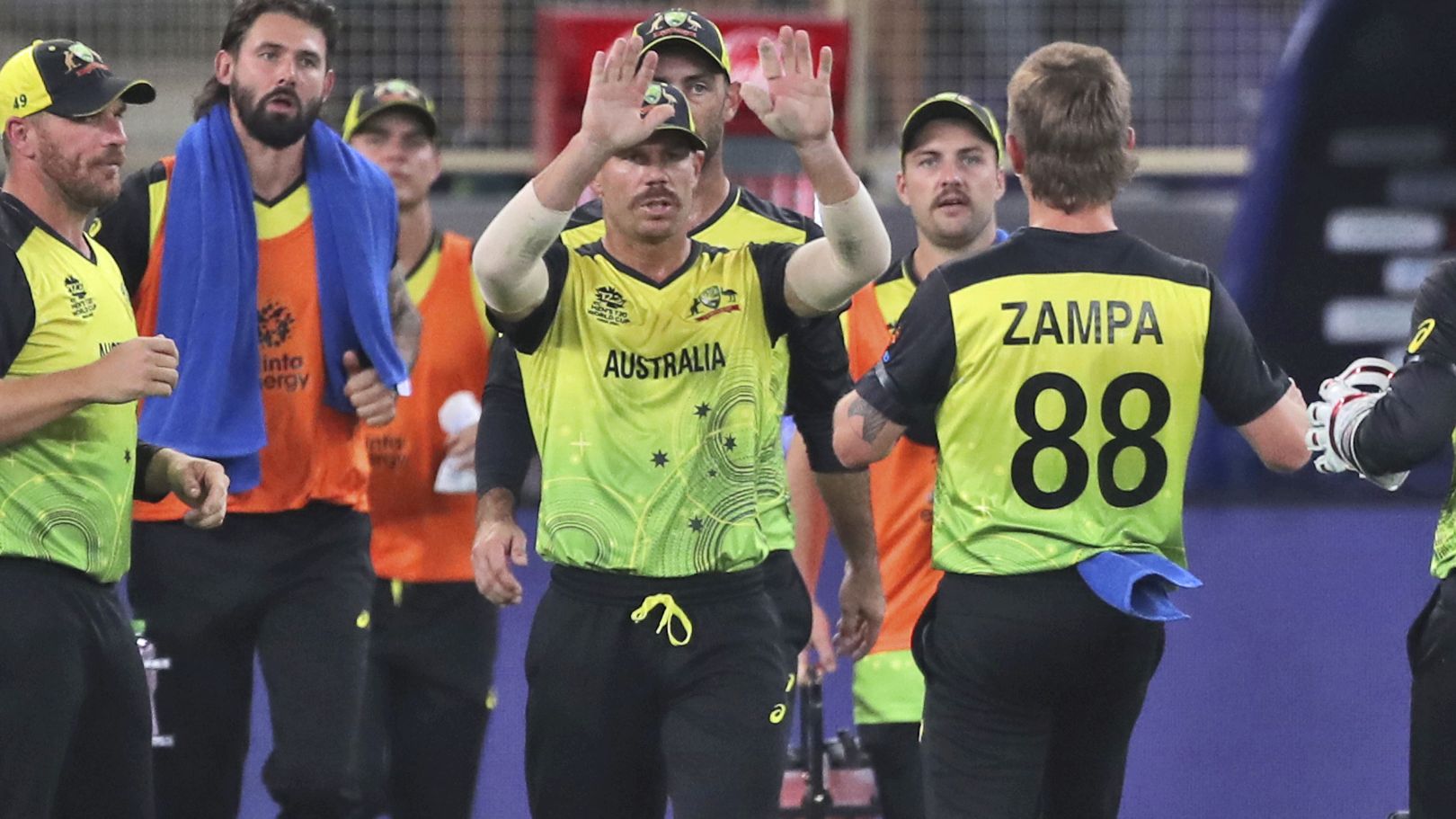 Australia players celebrate the dismissal of Pakistan&#x27;s captain Babar Azam.