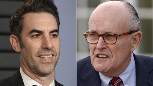 Borat creator and actor Sacha Baron Cohen (left) and Rudy Giuliani who appears in a scene in the new "Borat" film. The scene, which was filmed in a New York hotel room in July, resulted in Giuliani calling police.