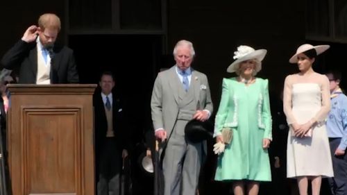 Prince Harry appears distracted as a bee buzzes around his ear. Picture: Twitter/Kensington Palace