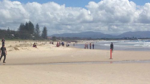 A doctor on Byron Bay's Main Beach was unable to save a man believed to have been attacked by a shark. (9NEWS)