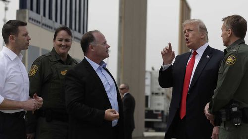 President Donald Trump reviews border wall prototypes, Tuesday, March 13, 2018, in San Diego. (AP)