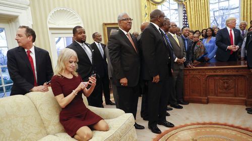 Counselor to the President Kellyanne Conway sat on the couch in the Oval Office during a presidential meeting on Feb. 27, 2017. Photo: AP