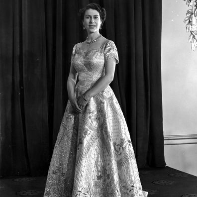 4th June 1953:  Queen Elizabeth II wearing a gown designed by Norman Hartnell for her Coronation ceremony.  (Photo by Central Press/Getty Images)
