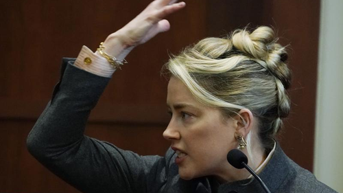Actor Amber Heard testifies in the courtroom at the Fairfax County Circuit Courthouse in Fairfax, Virginia on Monday, May 16, 2022.