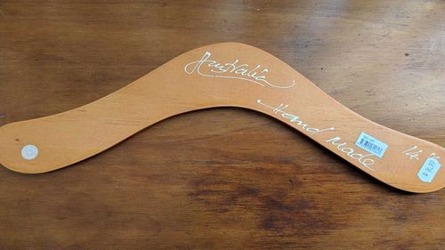 This boomerang, purchased by nine.com.au, was sold in Sydney for less than $10. The boomerang reads “Australia” and “hand made” but contains a small sticker that reads “Made in Vietnam”.