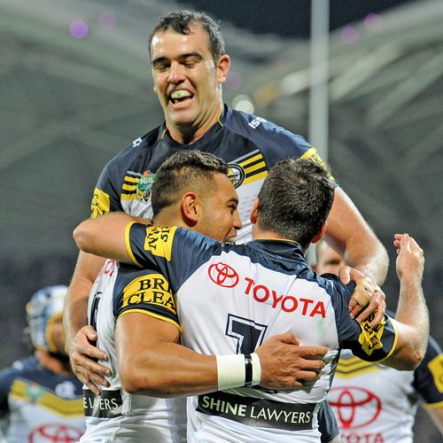 Cowboys celebrate after the siren and winning NRL 2nd Preliminary finals. (AAP)
