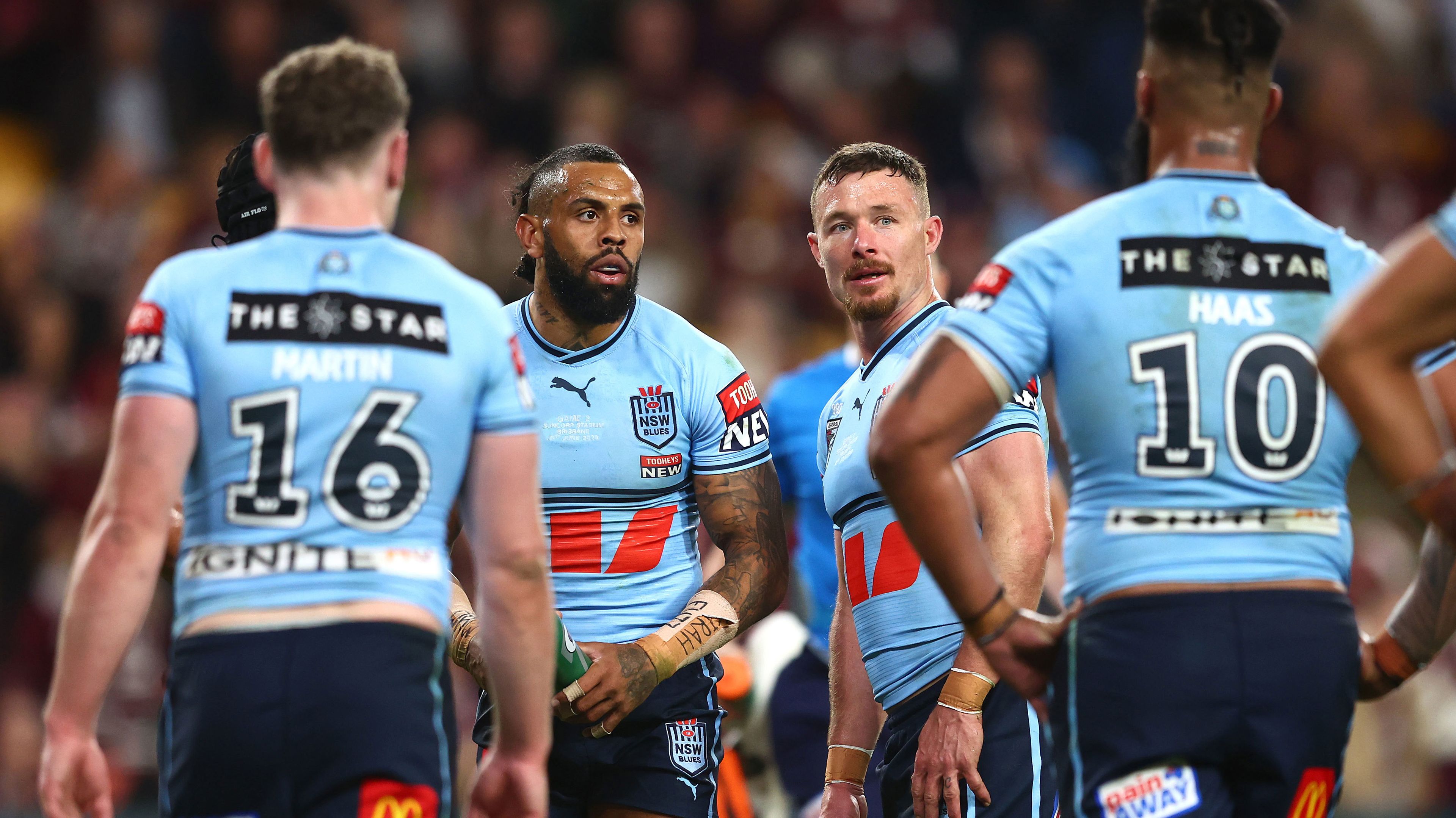 NSW players gather after conceding a try to Queensland in State of Origin II.