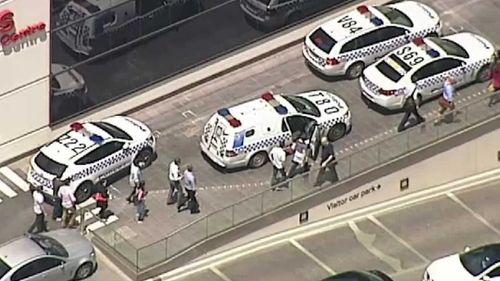 Police at the scene in Hawthorn East this afternoon.