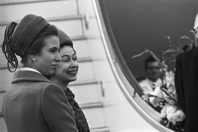 Queen Elizabeth II and her daughter Princess Anne boarding the plane at Heathrow airport for their tour of New Zealand and Australia in March 1970. (Photo by Ted West/Central Press/Getty Images)
