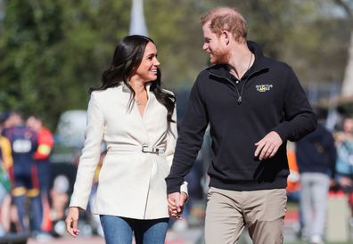 Prince Harry, Duke of Sussex and Meghan, Duchess of Sussex attend the Athletics Competition during day two of the Invictus Games The Hague 2020 at Zuiderpark on April 17, 2022 in The Hague, Netherlands. (Photo by Chris Jackson/Getty Images for the Invictus Games Foundation)