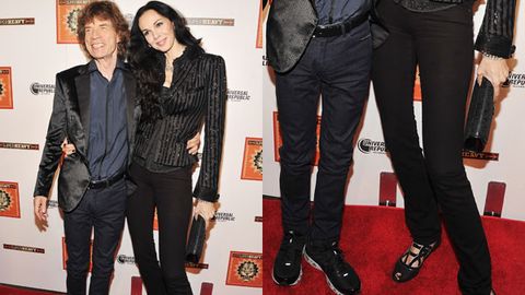 Mick Jagger's super tall girlfriend crouches to match his height on the red carpet