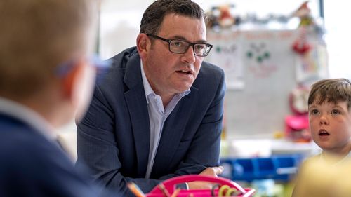 Premier Daniel Andrews meets children at a school in Victoria.