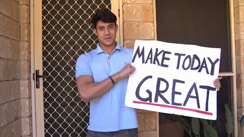 Christopher Matecki had some more stunts in store for 9NEWS, brandishing his slogan of the day for the cameras. Picture: 9NEWS