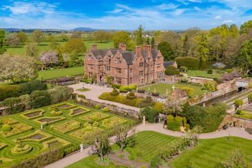 this mansion has a pool that transforms into a dance floor domain