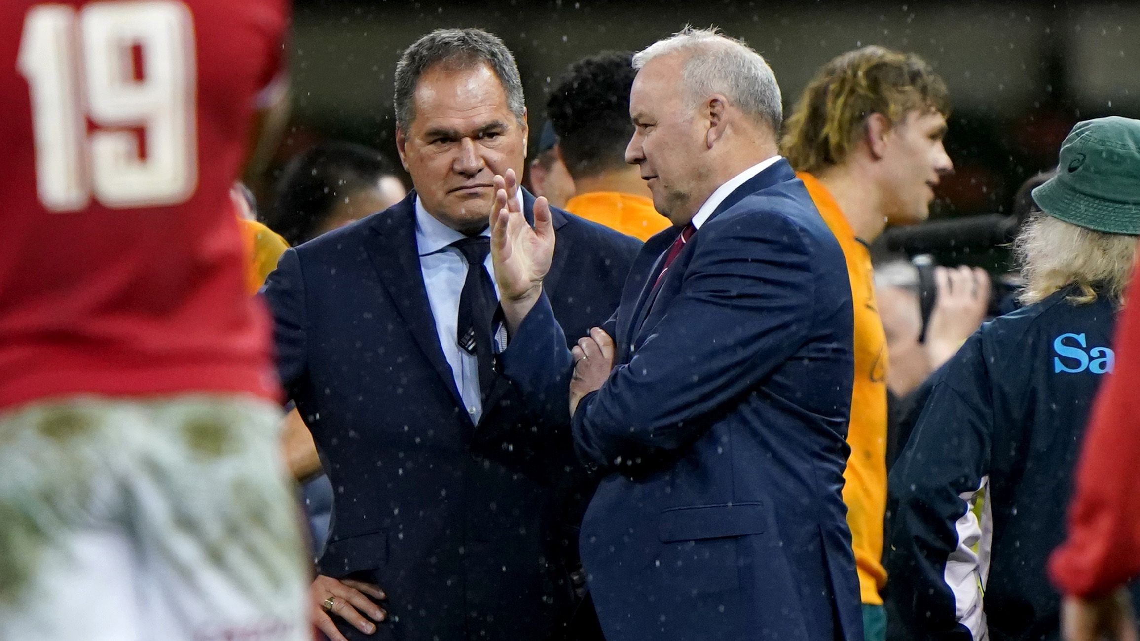 Australia coach Dave Rennie (left) and Wales coach Wayne Pivac speak after the final Spring Tour Test in Cardiff.