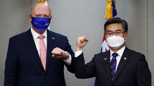 Suh Wook meeting with his Australian counterpart Peter Dutton last year.