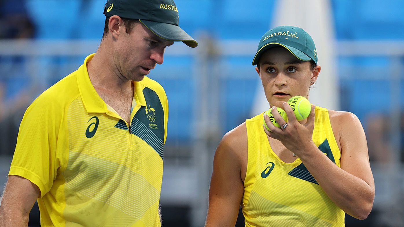 Barty closes in on medal after tense win