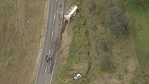 Police and emergency services attend the crash scene at Staghorn Flat.