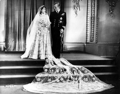 20th November 1947:  Princess Elizabeth, and The Prince Philip, Duke of Edinburgh at Buckingham Palace after their wedding.  (Photo by Hulton Archive/Getty Images)
