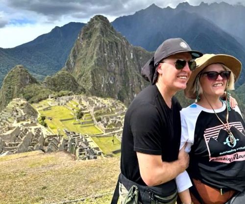 Janelle Nicholson is among the Aussies stranded at the popular tourist attraction.She spent a fortnight volunteering with a local not-for-profit before completing the famous hike with her blind husband.