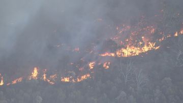 Warning as bushfire threatens Perth Hills