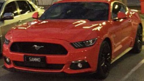 Mr Thomspon's distinct orange Mustang. (Queensland Police)