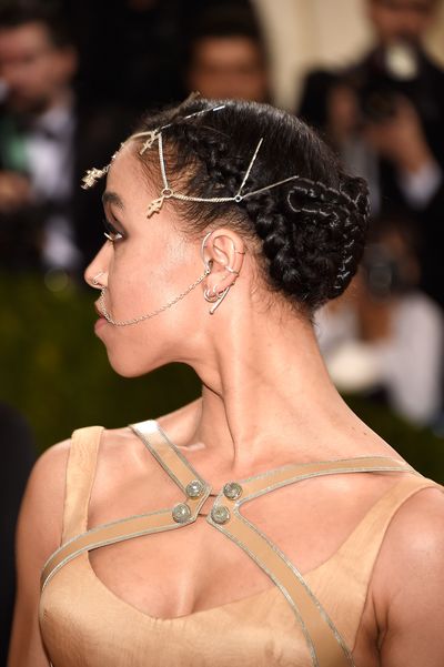 No one can pull off multiple facial piercings at a black tie ball like FKA twigs.