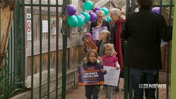 Thousands of childcare workers in Melbourne strike for better pay