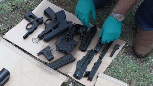 Several firearms were seized from the Charlestown home in Lake Macquarie.