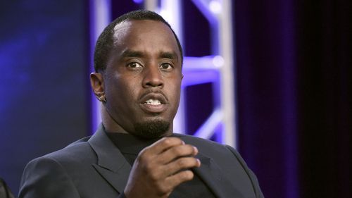 FILE -Sean 'Diddy' Combs participates in "The Four" panel during the FOX Television Critics Association Winter Press Tour in Pasadena, Calif., Jan. 4, 2018. (Photo by Richard Shotwell/Invision/AP, File)