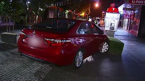 Melbourne man narrowly misses family after allegedly driving car down pedestrian strip