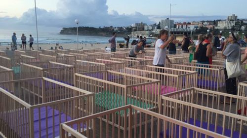 'Let Them Stay' protesters set up cribs on Bondi Beach