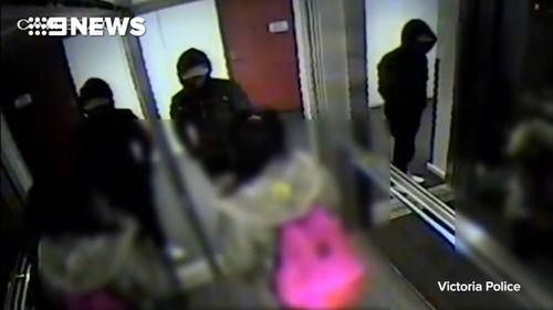 CCTV shows the suspect and his victim inside the apartment building elevator.