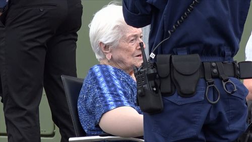 A 90-year-old woman was being assisted out of a Nissan Pulsar when the man confronted the pair with a knife.