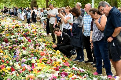 Edoardo Mapelli Mozzi, husband of Princess Beatrice, joins members of the public viewing floral tributes to the Queen at Green Park in London on September 12.