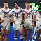 Canterbury Bulldogs players gather behind their try line after conceding a try to the Sharks in round 16.