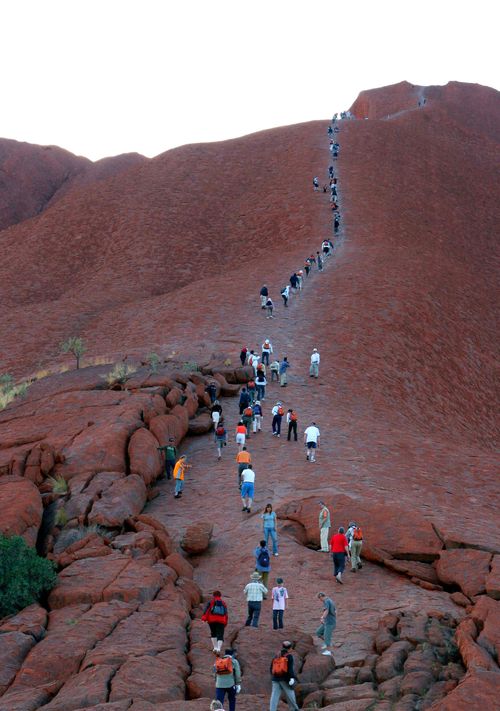 Climbing Uluru is not banned, however traditional Aboriginal elders disapprove. (AAP)