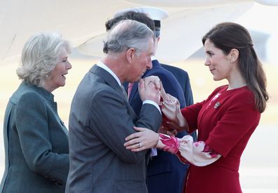 Princess Mary recycles red coat but now with a shorter hem