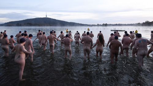 Swimmers braved freezing conditions in Canberra. Picture: AAP