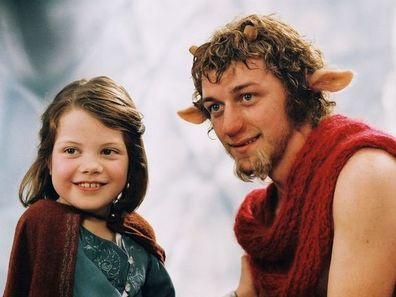 Georgie Henley as Lucy Pevensie and James McAvoy as Mr Tumnus in The Chronicles of Narnia (2005).