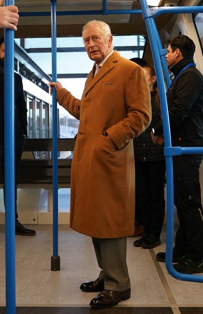 King Charles III travels in a DART carriage for the three-minute journey to the Luton DART central terminal, during a visit to Luton DART Parkway Station
