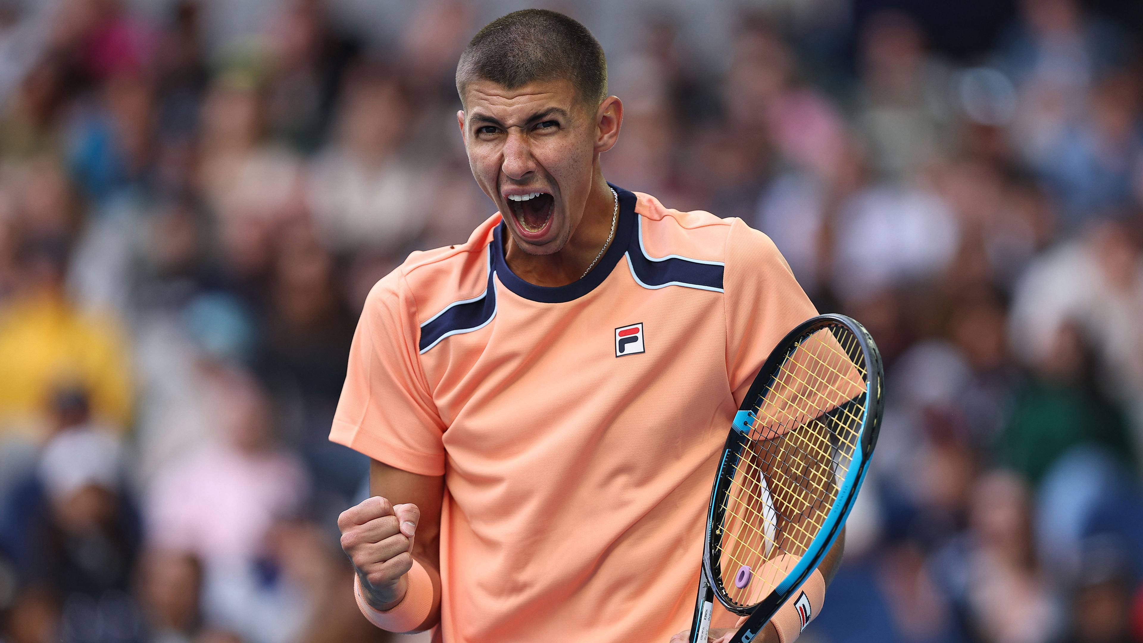 Alexei Popyrin reacts after winning a big point against Taylor Fritz in the second round of the 2023 Australian Open.