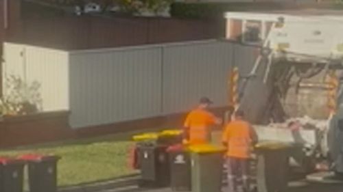 Council collectors in the Canterbury-Bankstown LGA were caught on camera picking up red-lidded rubbish bins and dumping them into the same truck as the contents of yellow recycling bins.