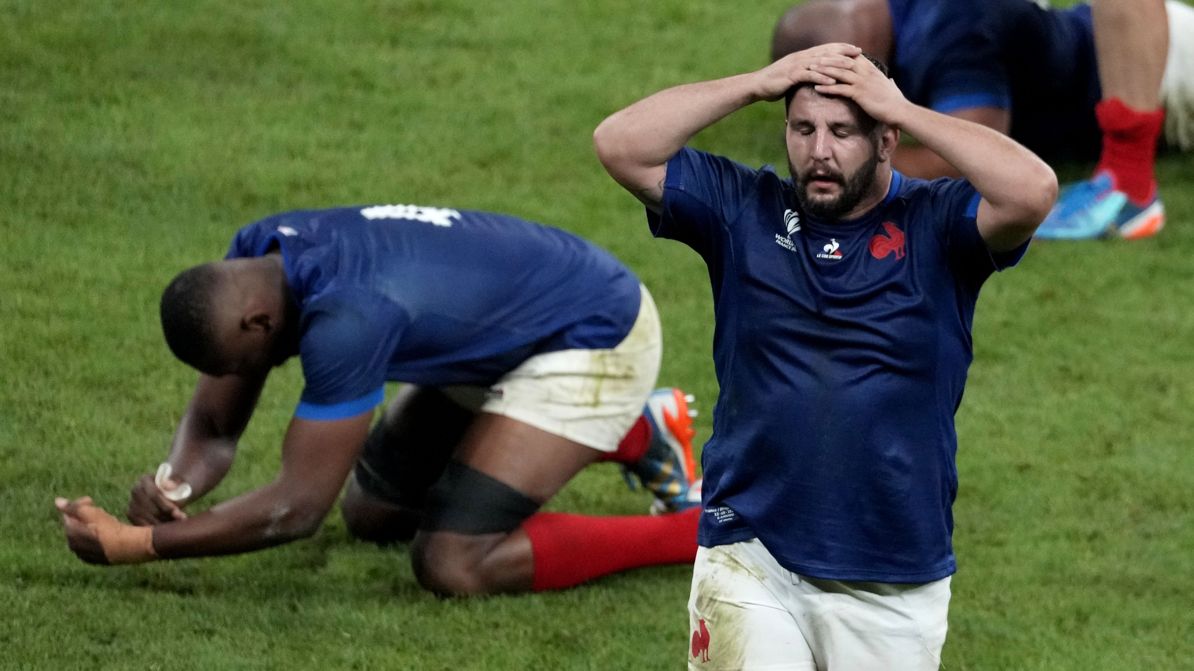 French players react after being beaten by South Africa by one point in the Rugby World Cup quarter-final.