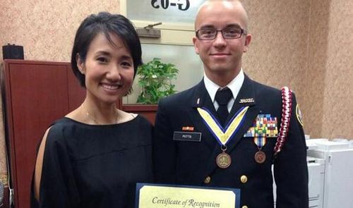 Samarin being presented with an award while enrolled in high school.